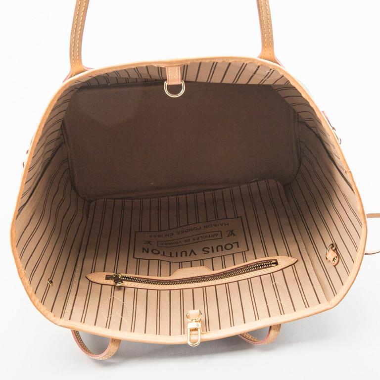 A Louis Vuitton Neverfull MM bag.