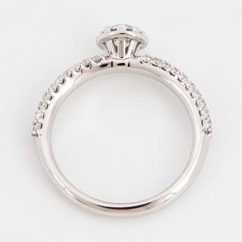 Round brilliant-cut diamond ring.