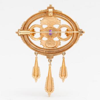 Otto Roland Mellin, A 14K gold brooch/pendant "Memory" with cultured pearls and an amethyst. Kalevala Koru, Helsinki 1997.