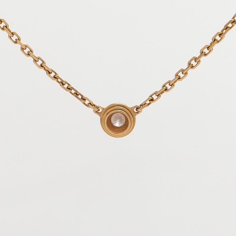 Cartier, an 18K gold 'd'Amour' necklace, with a brilliant-cut diamond.