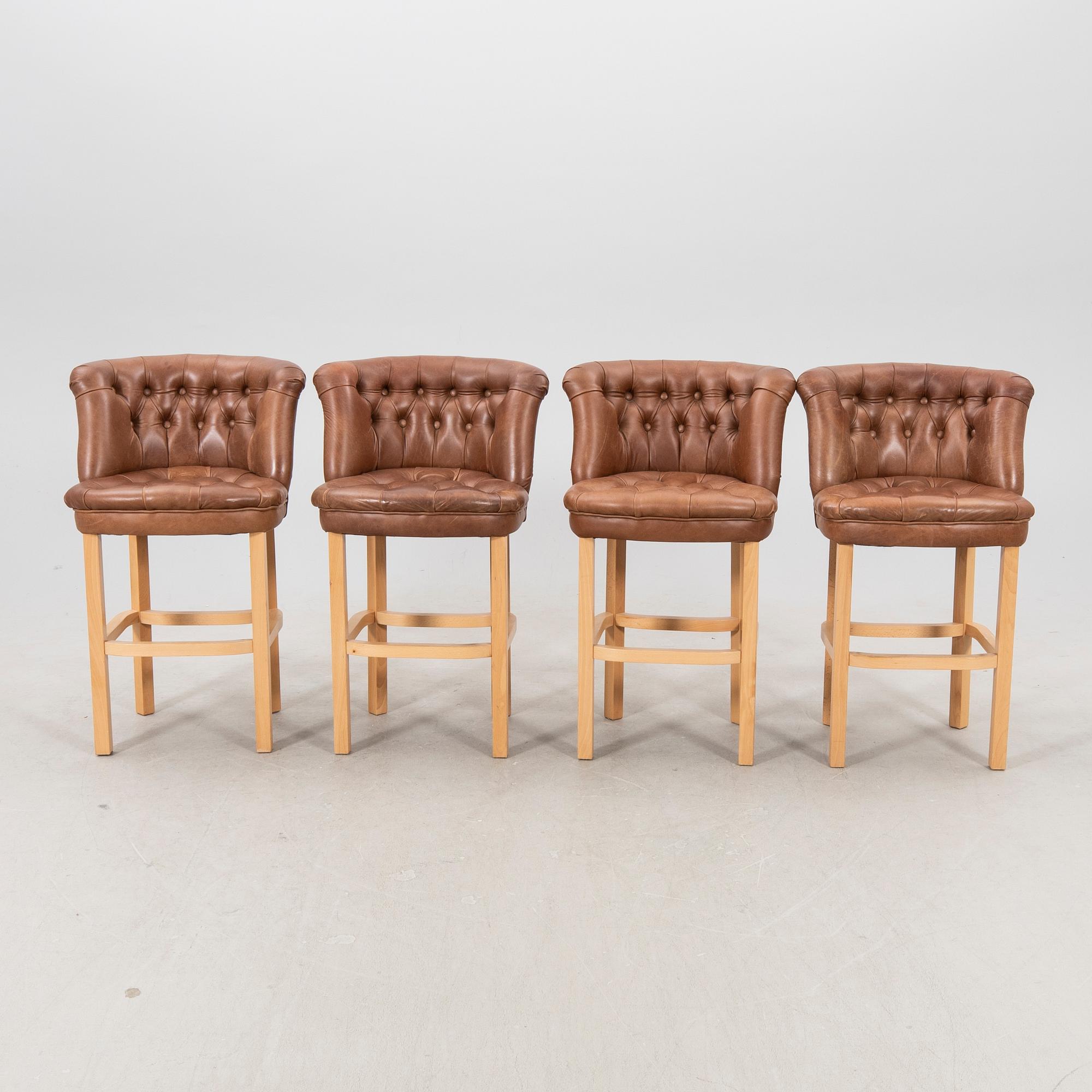 A set of four Milton barstools Lexington 21st century.
