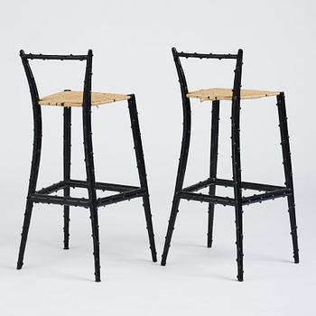 Piero Fornasetti, a pair of bar stools, Milano, Italy, 1960-70's.