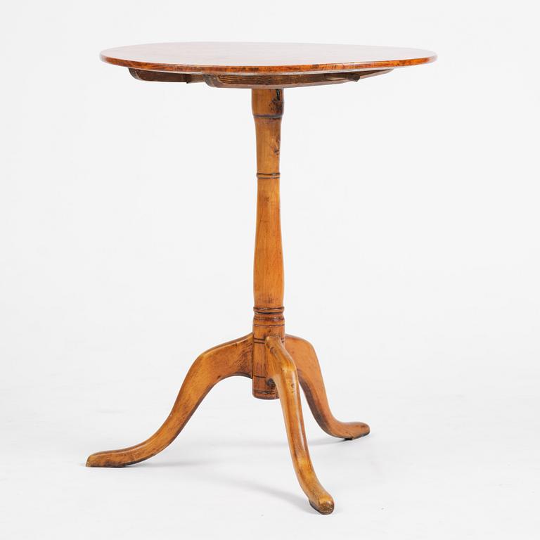 A tilt top table, from around the year 1800.