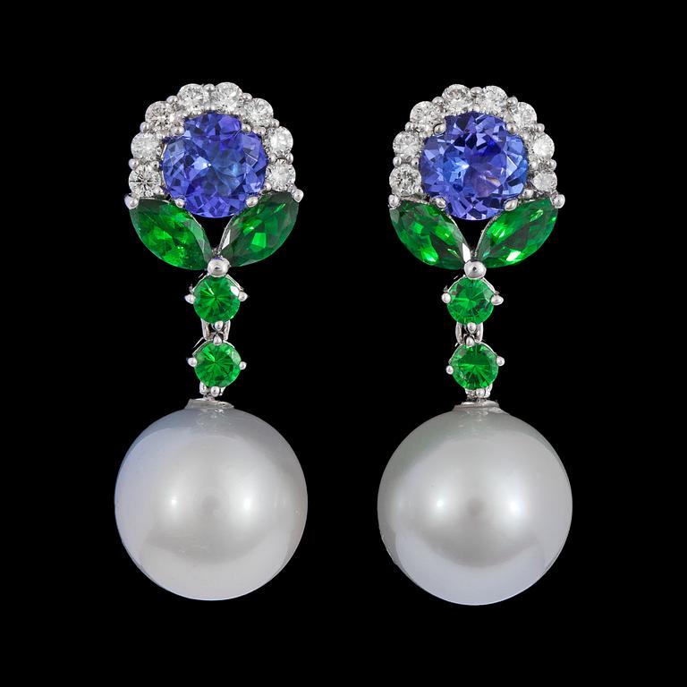 A pair of cultured South sea pearl, tanzanite, tsavorite and brilliant cut diamond earrings, tot. 0.70 cts.