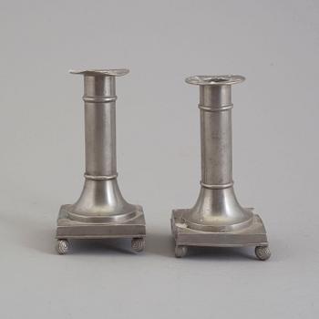 A pair of pewter candlesticks from Schreuder & Olsson Tenngjuteri, Stockholm, 1924.