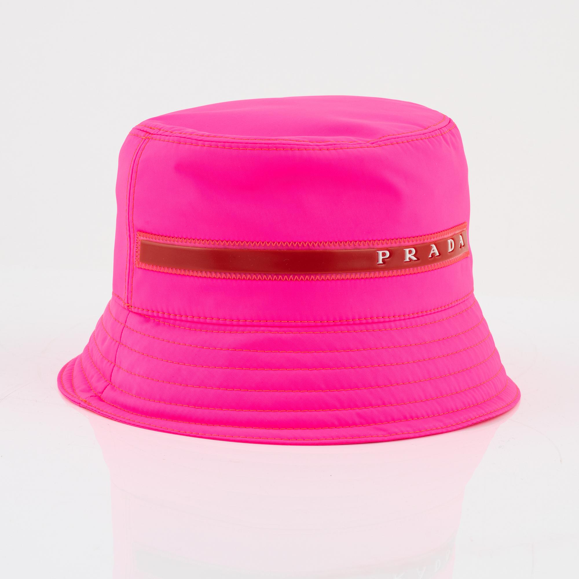 Prada a neon pink bucket hat. Bukowskis