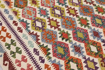 A Kilim carpet, approx. 344 x 262 cm.