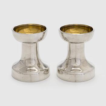 Bertel Gardberg, a pair of candlesticks in pewter and brass for Hopeatehdas Oy, Helsinki.
