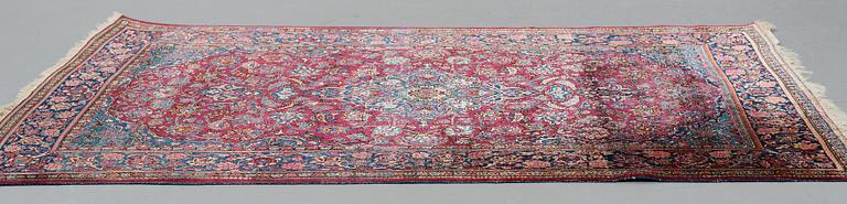 MATTO, a semi-antique silk Kashan, ca 185-198 x 125-132,5 cm.