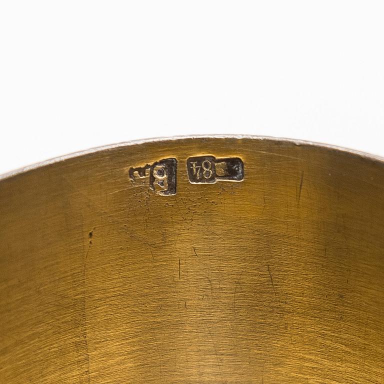 A silver napkin ring, mark likely of Vasily Andreyev, Moscow 1908-17.