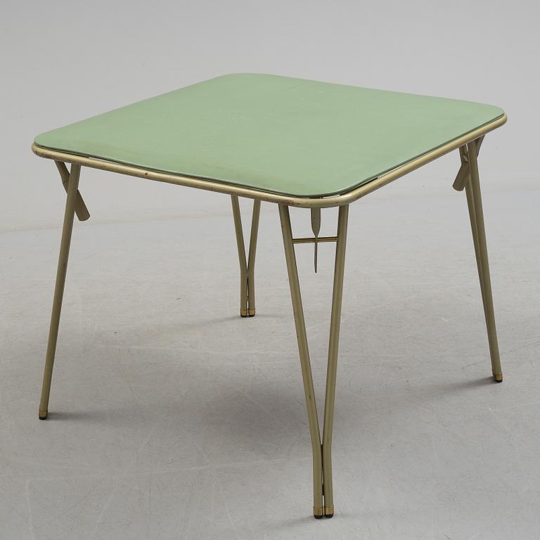 A table and four chairs by Dipetrol, second half of the 20th century.