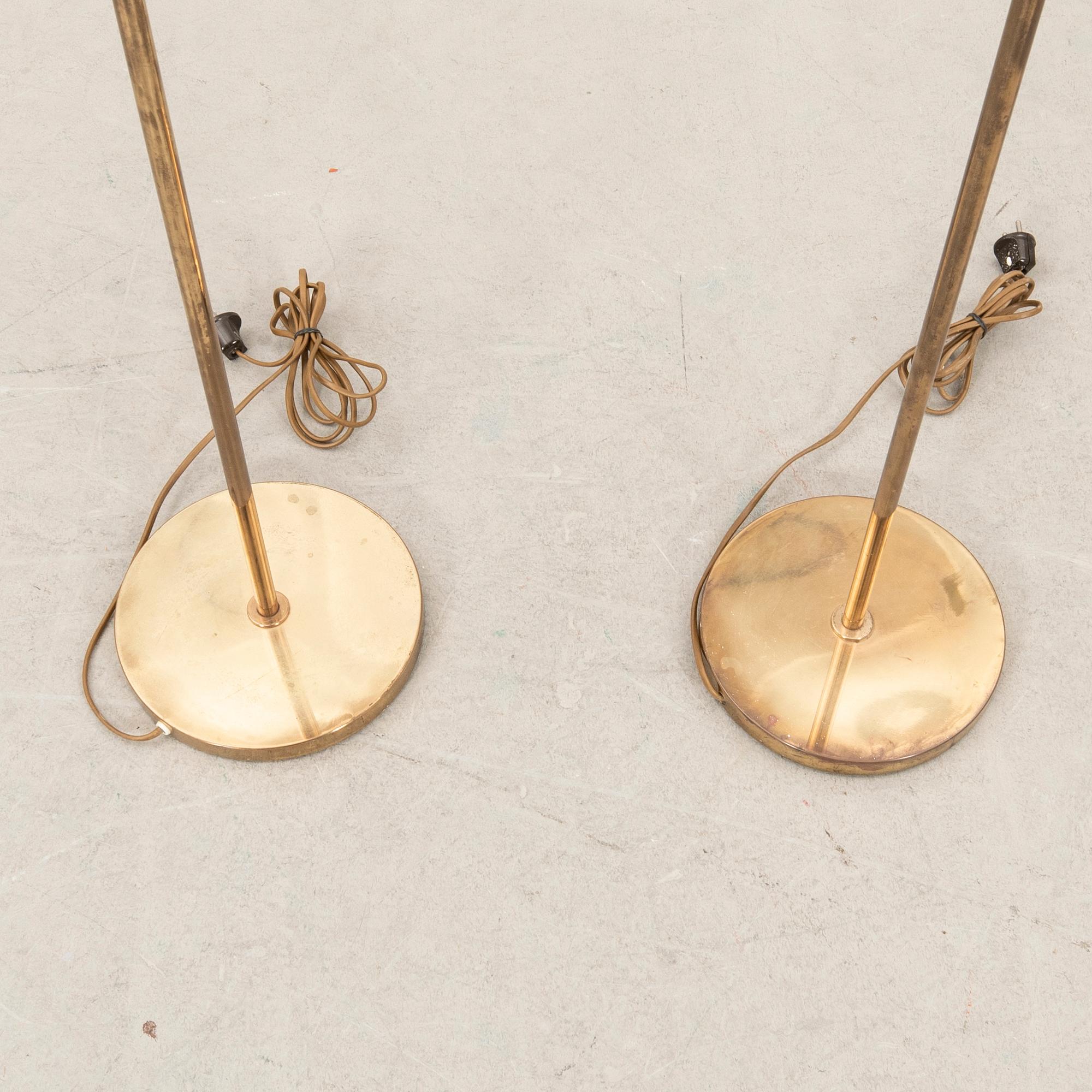 Floor lamps, a pair probably Aneta, late 1900s.