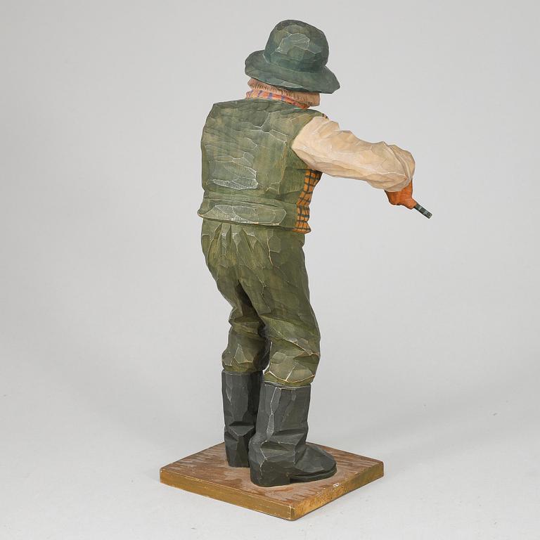 HERMAN ROSELL, a painted wood sculpture signed and dated 1934.