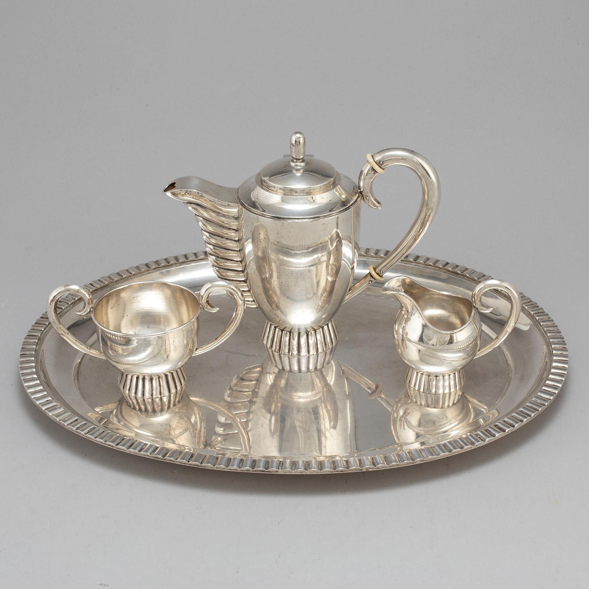 A four piece 20th century Art Deco silver coffee service.