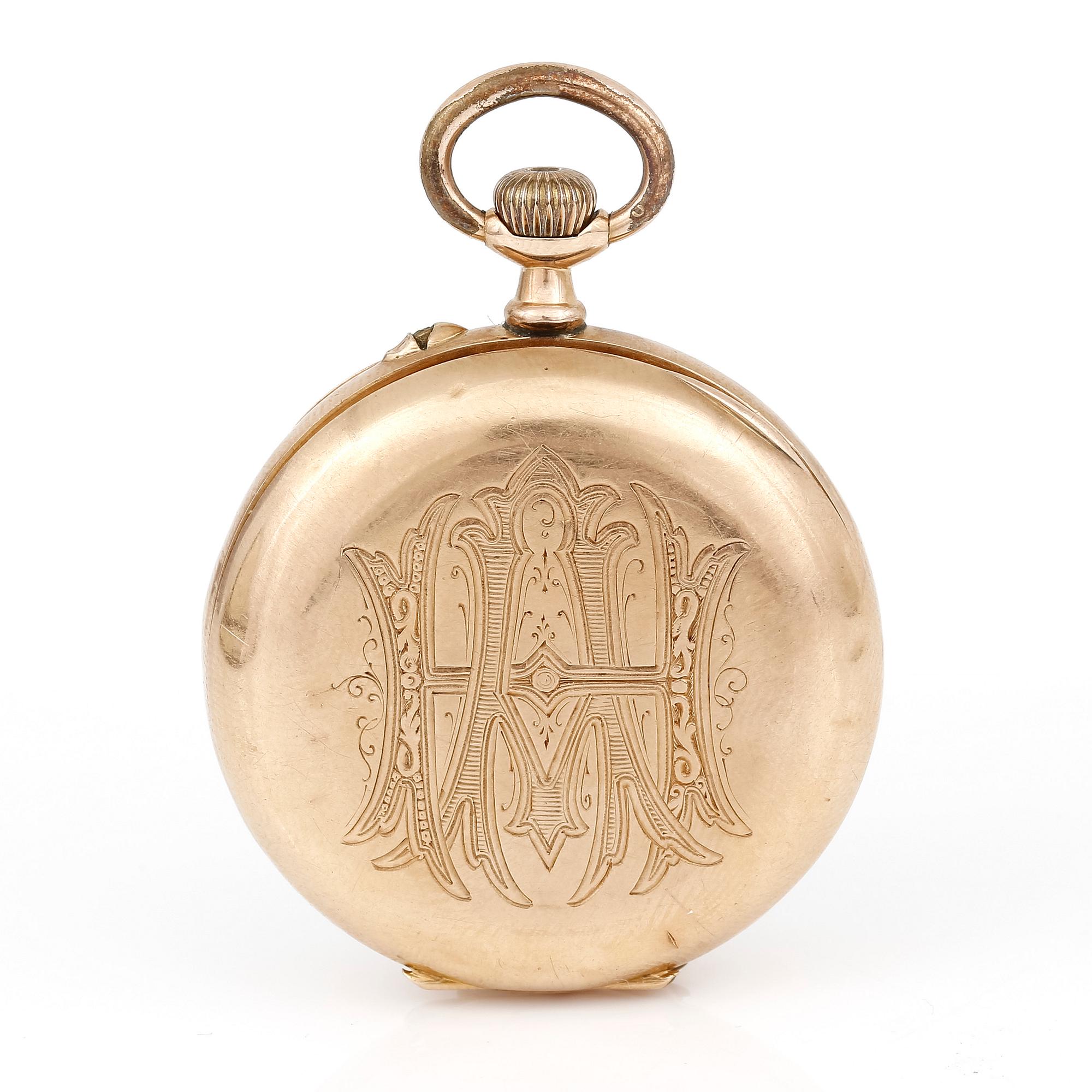 FICKUR, 18K guld och gulmetall, 1900-talets början.