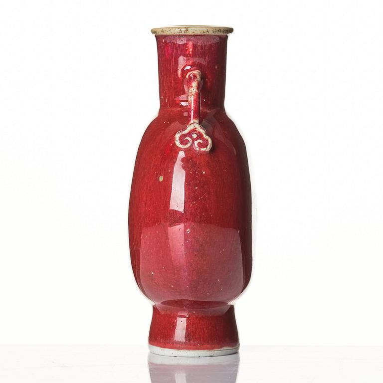 A sang de boef glazed moon flask, Qing dynasty, circa 1900.