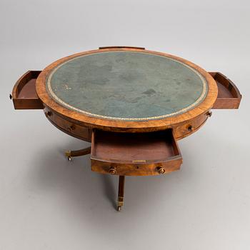 An early 20th century English drum table.