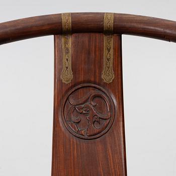 A Chinese hardwood folding chair, 20th century.