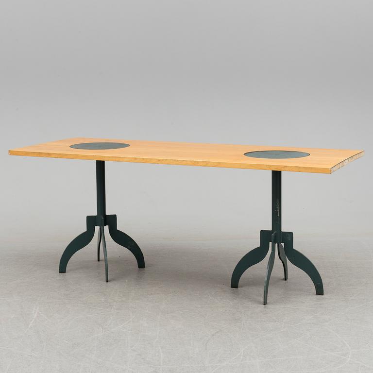 A "Triptyk" dining table by Jonas Bohlin for Källemo.