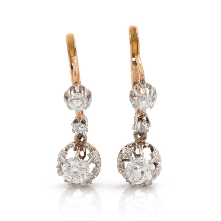 A pair of old- cut diamond earrings with Russian setting. Total carat weight circa 1.50 ct.