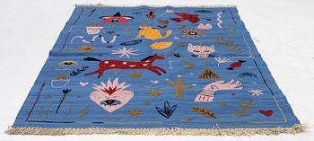 A hand-embroidered Kelim rug, 185 x 124 cm.