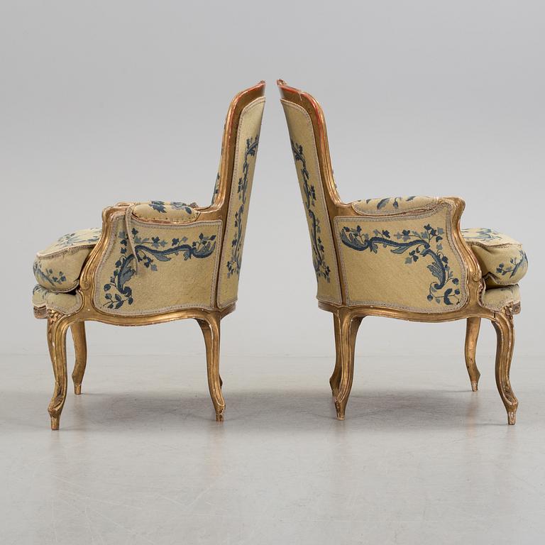 A Rococo 18th century bergere. One later, very similar, bergere included.