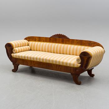 A mahogany sofa dated 1840.