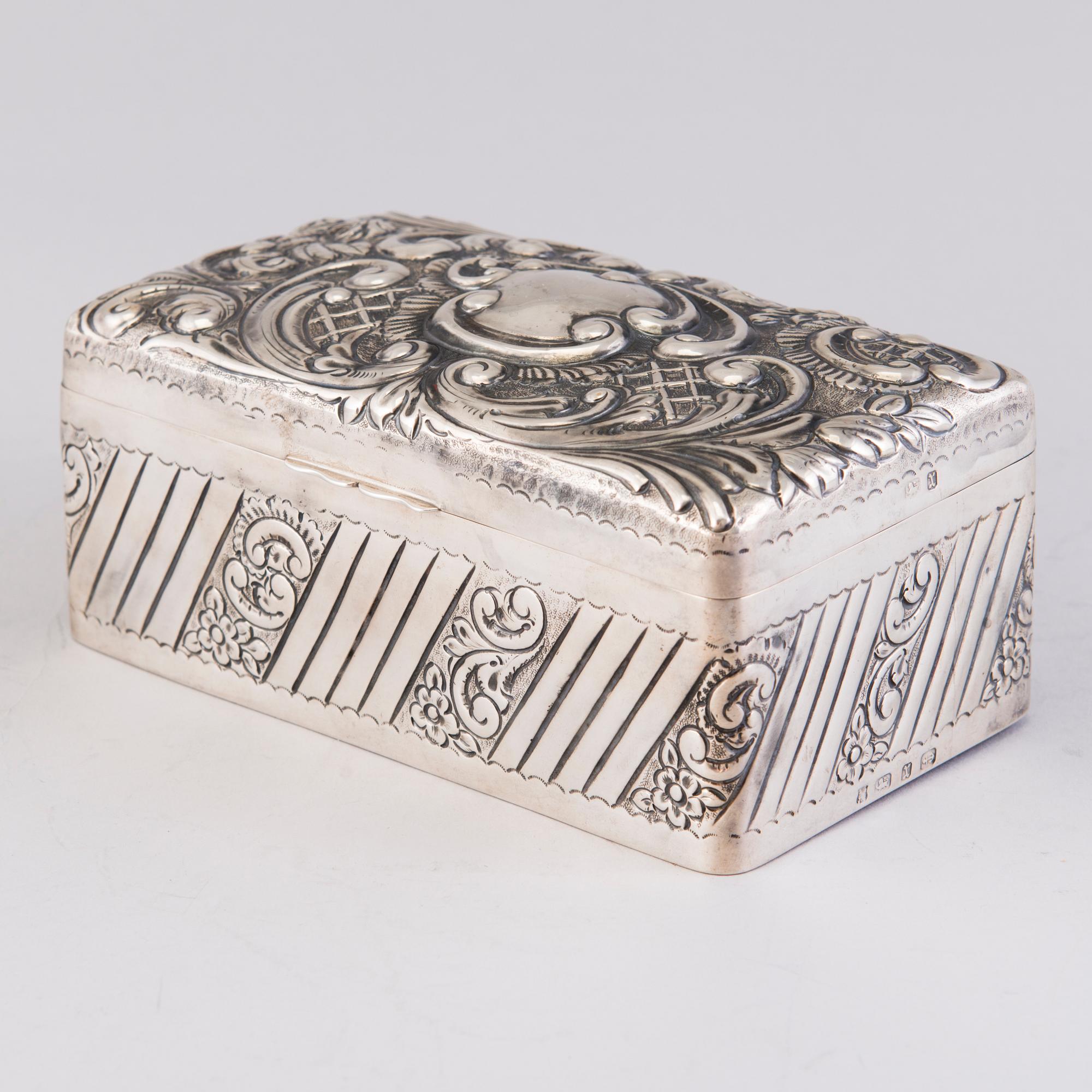 A silver cigar box, mark of A. & J. Zimmerman, Birmingham 1897.