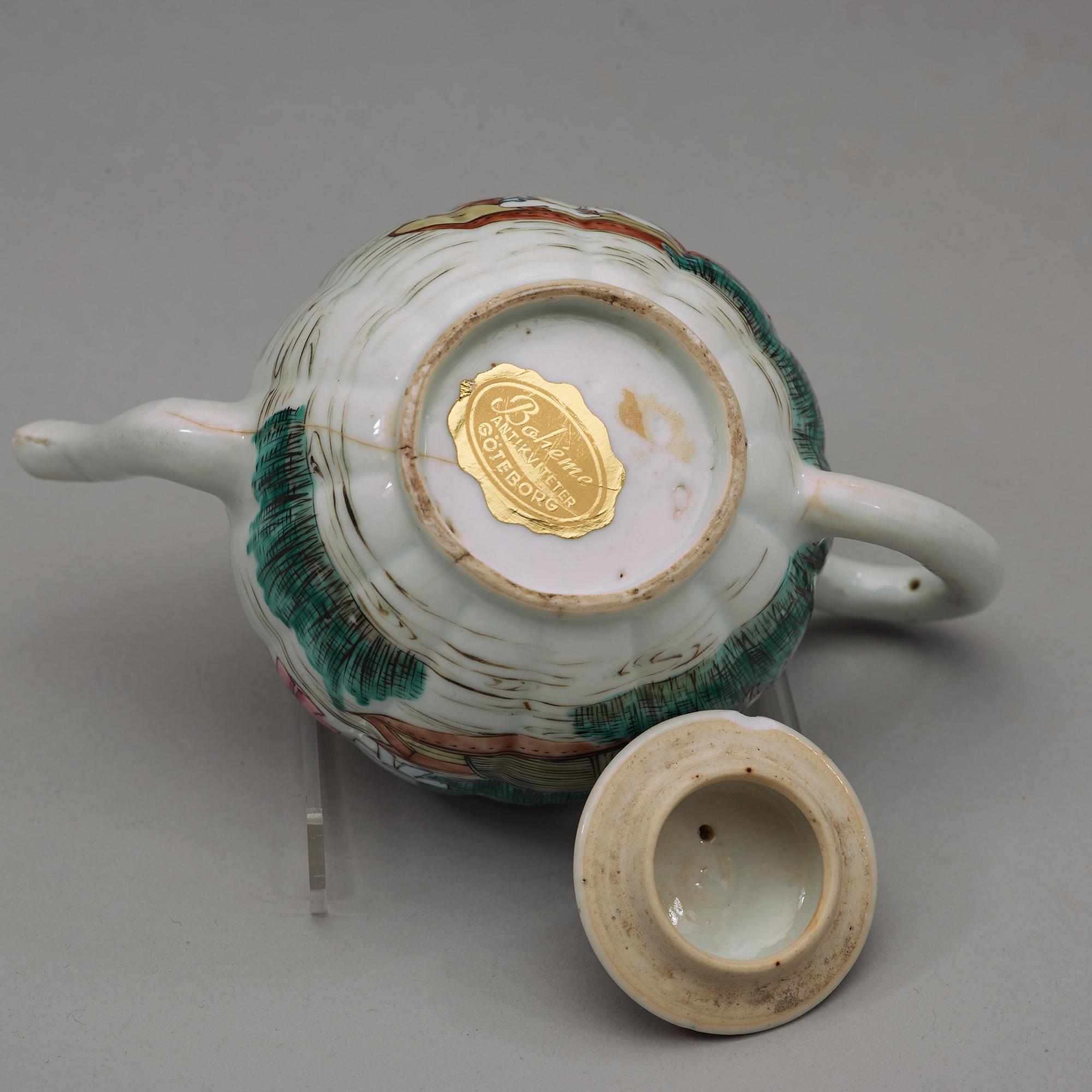 A famille rose teapot with cover, Qing dynasty, 18th Century.
