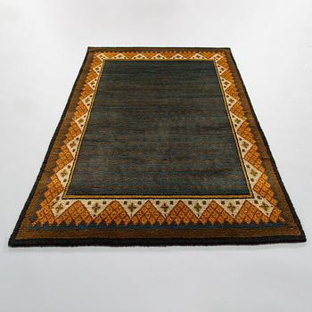 A 1930's Finnish rya rug. Circa 19 x 135 cm.