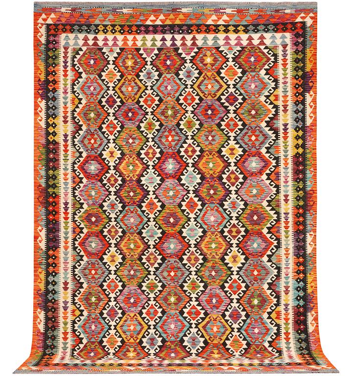 An Afghan Kilim carpet, c. 298 x 202 cm.
