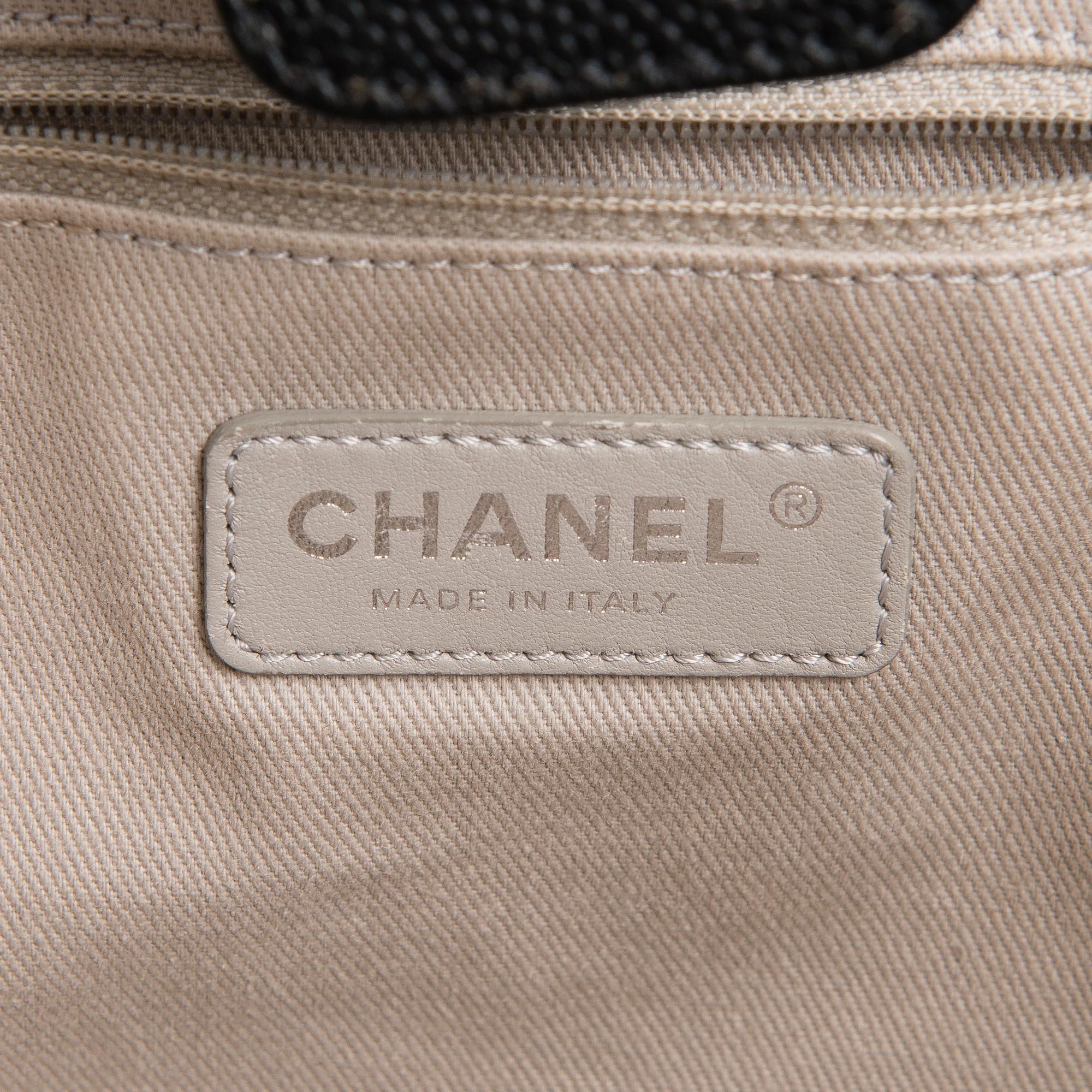 CHANEL, A Large Black Leather Shopping Bag.