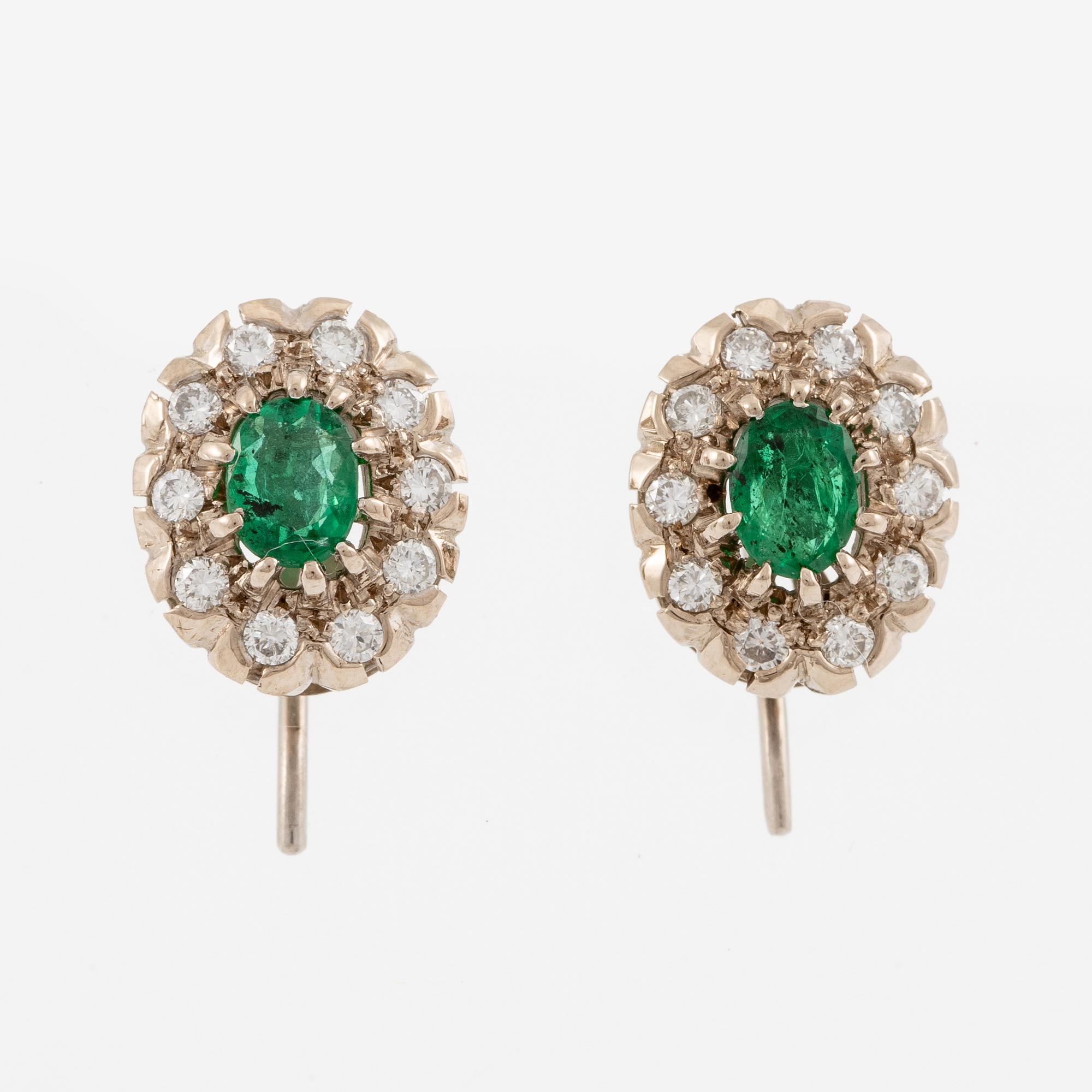 Earrings, carmosé. white gold with emeralds and brilliant-cut diamonds.