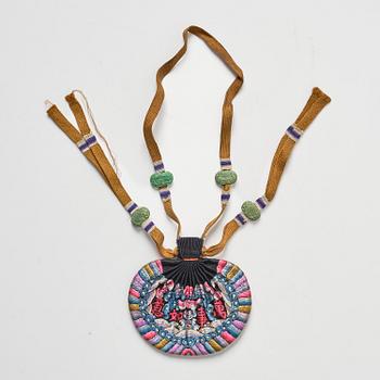 A set of three embroidered purses/ eye-glass cases, Qing dynasty, 19th century.