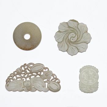 A set of four Chinese nephrite objects, 20th Century.