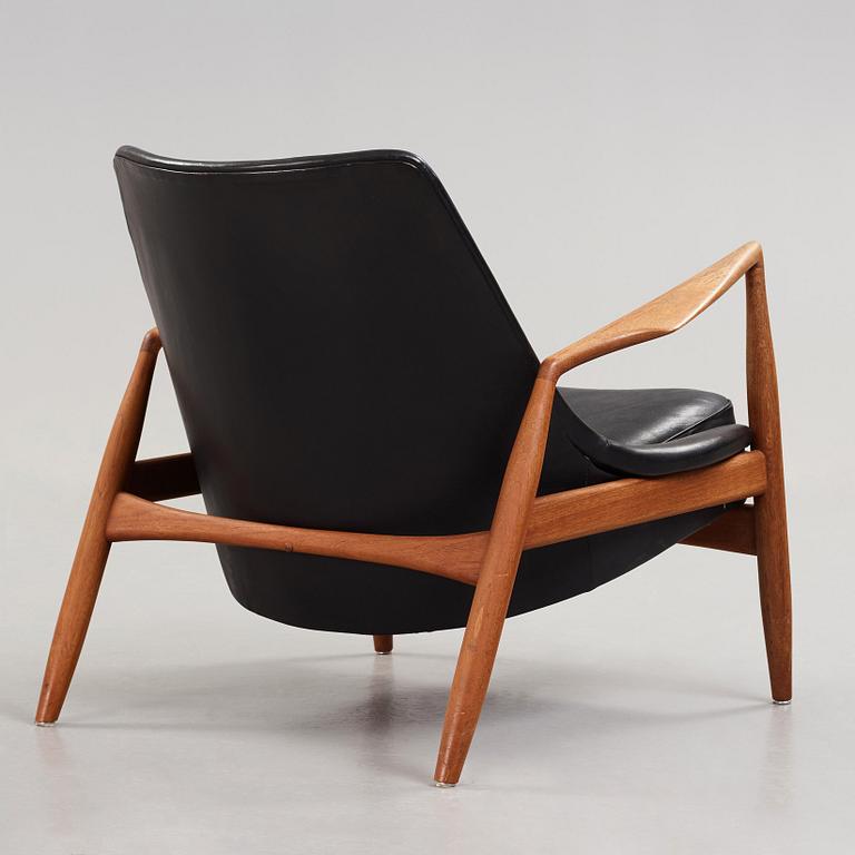 Ib Kofod-Larsen, a 'Seal' teak and black leather armchair, Olof Persson Möbler, Jönköping, Sweden 1950's-60's.