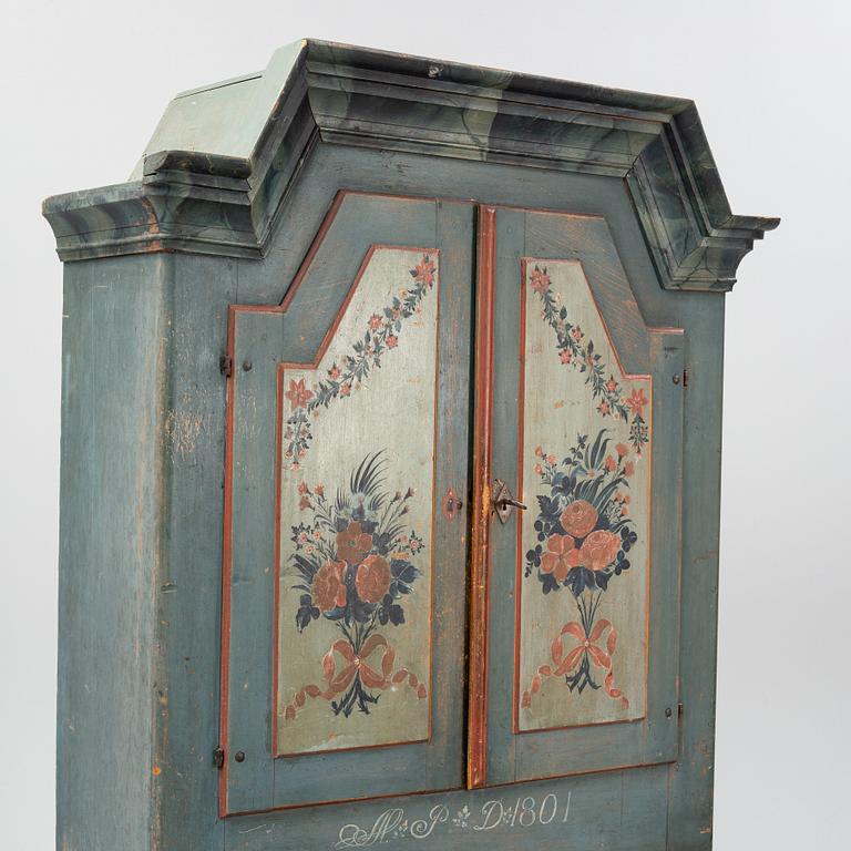 A painted Swedish cabinet from Jämtland, dated 1801.