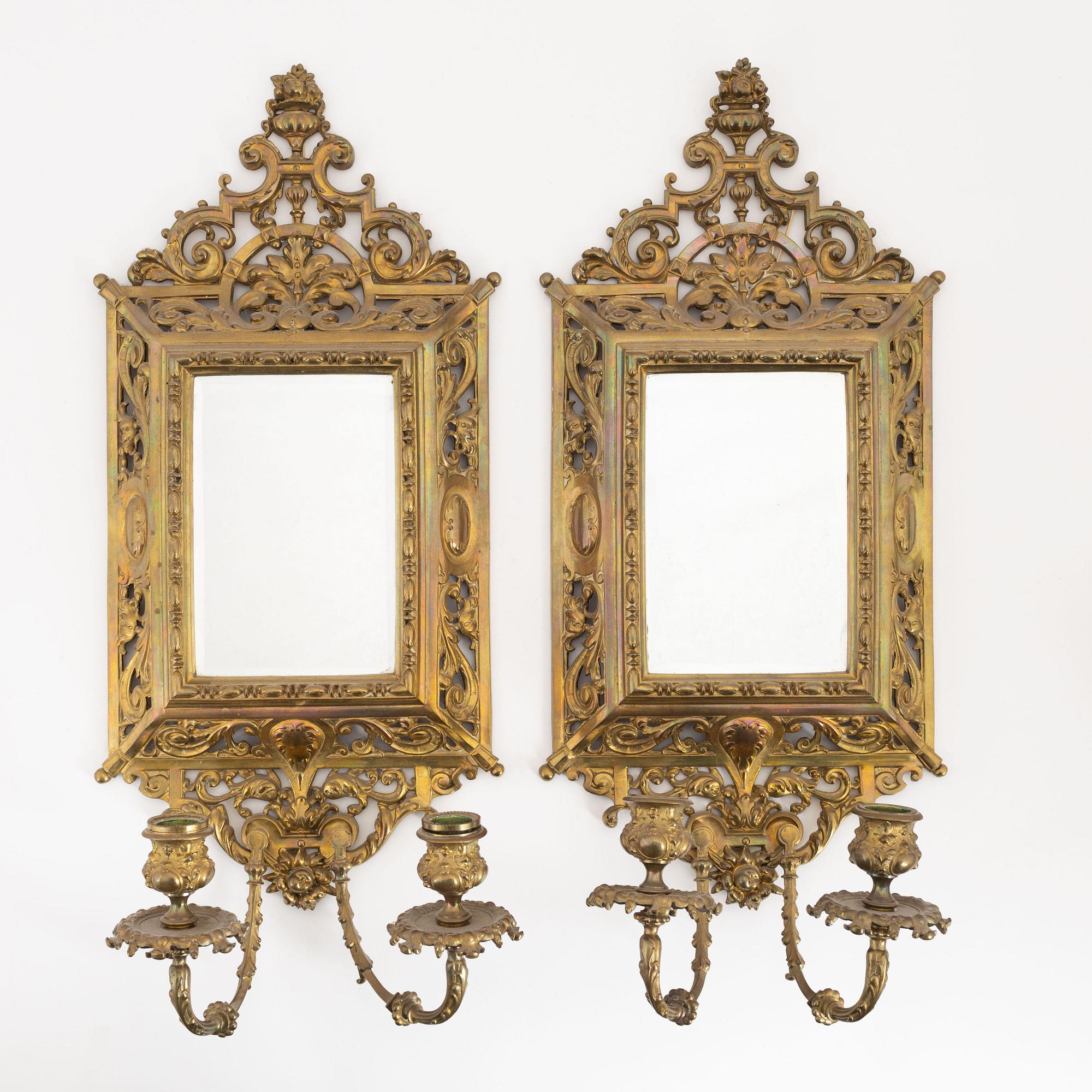 A pair of metal mirror sconces, first half of the 20th century.