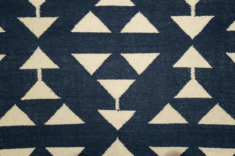 A carpet flat weave, c 272 x 170 cm.