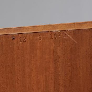 Otto Schulz, Boet, Gothenburg, probably, a cabinet covered with brown leather, dated 1942.