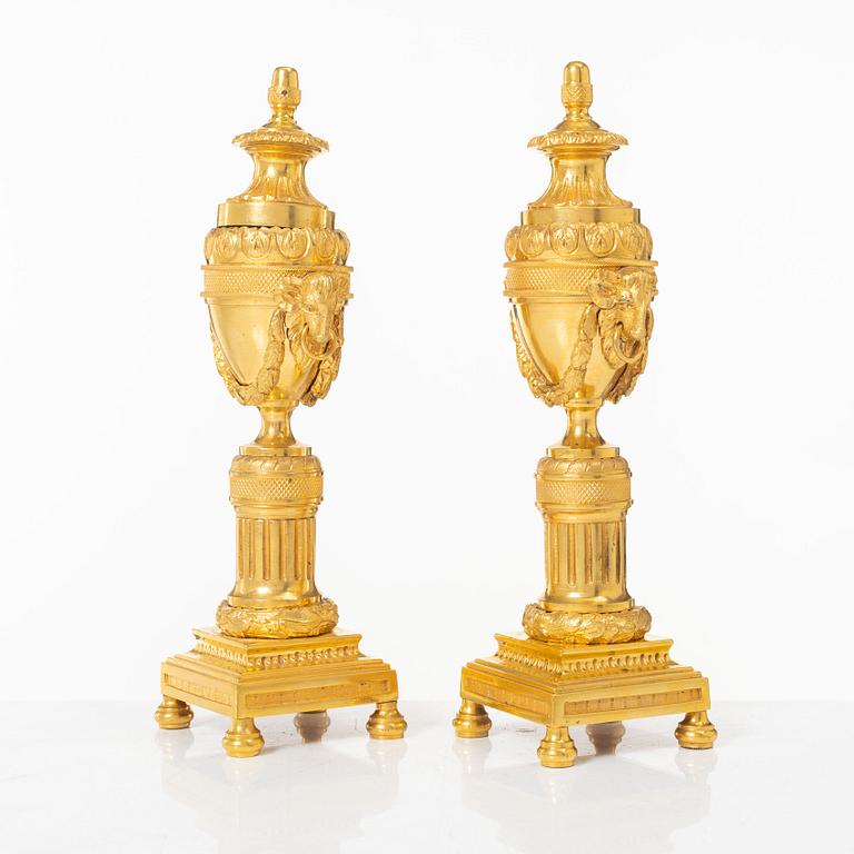 A pair of French Louis XVI style gilt-bronze casolettes, later part 18th century.