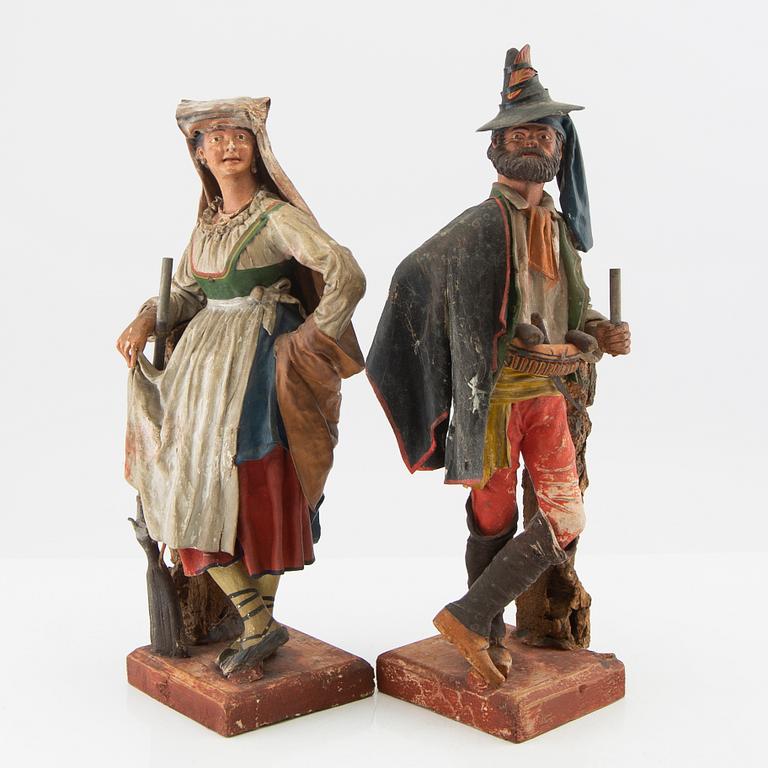 Figuriner ett par Italien omkring 1900.