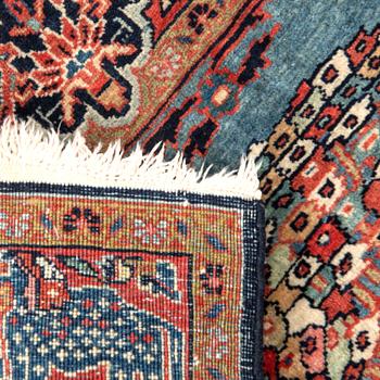 Keshan figural semi-antique rug, approximately 61x88 cm.