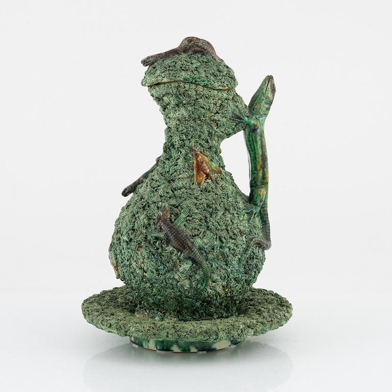 A majolica ewer with cover and stand, M. Mafra, Caldao, Portugal, late 19th Century.