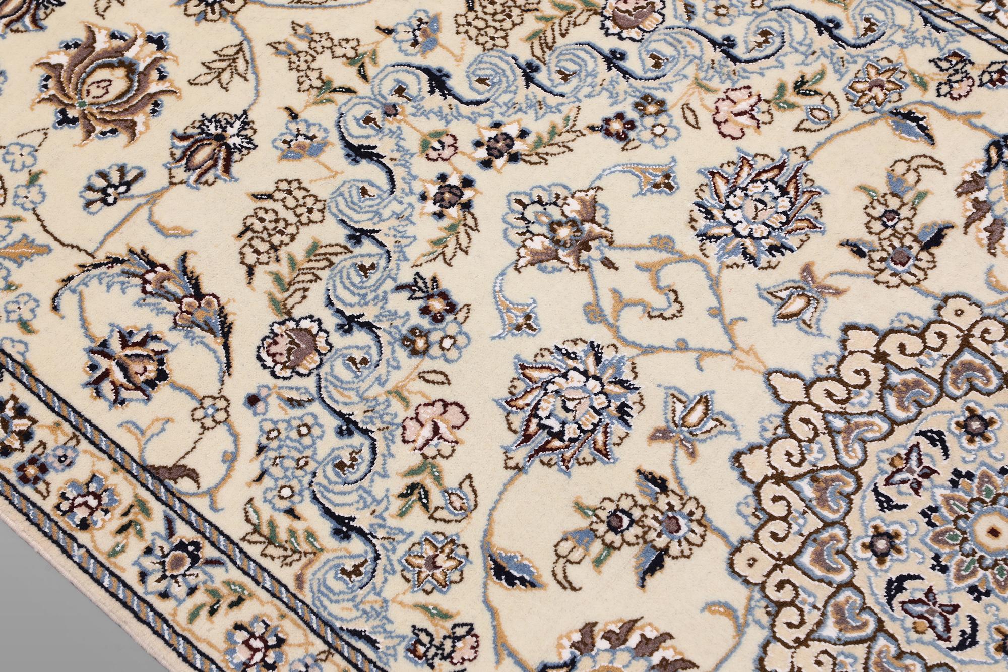 A Nain part silk runner carpet, 311 x 88 cm.