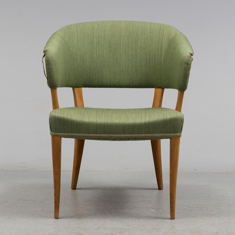 A "Lata Greven" armchair by Carl Malmsten.