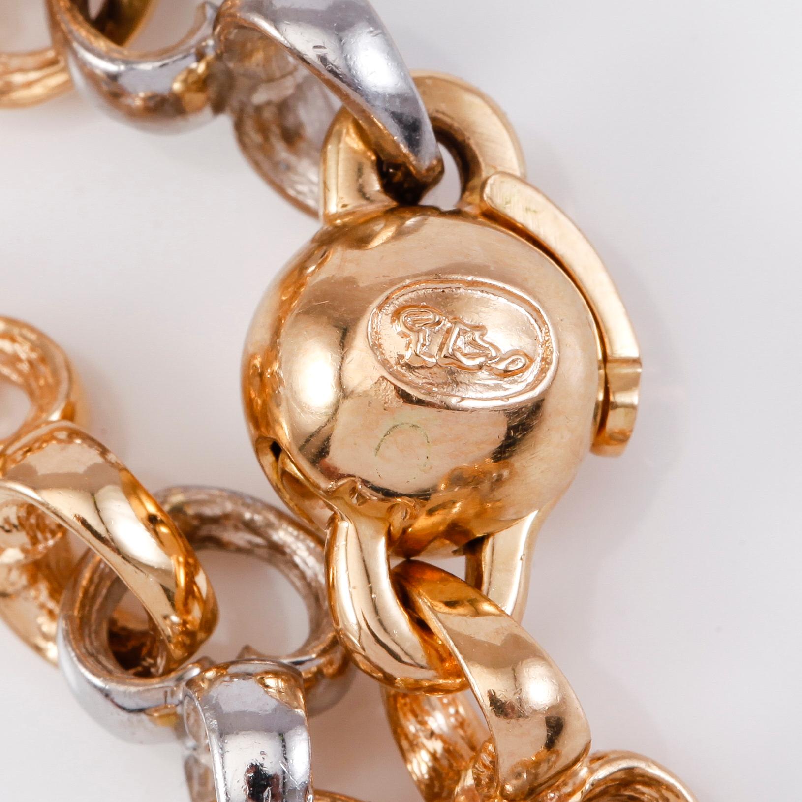 ARMBAND, 18K guld/vitguld samt mindre diamant, Per Borup. Total vikt ca 29 g.