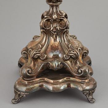 A pair of barocque style nine lights candelabra, silver plate, 20th Century.