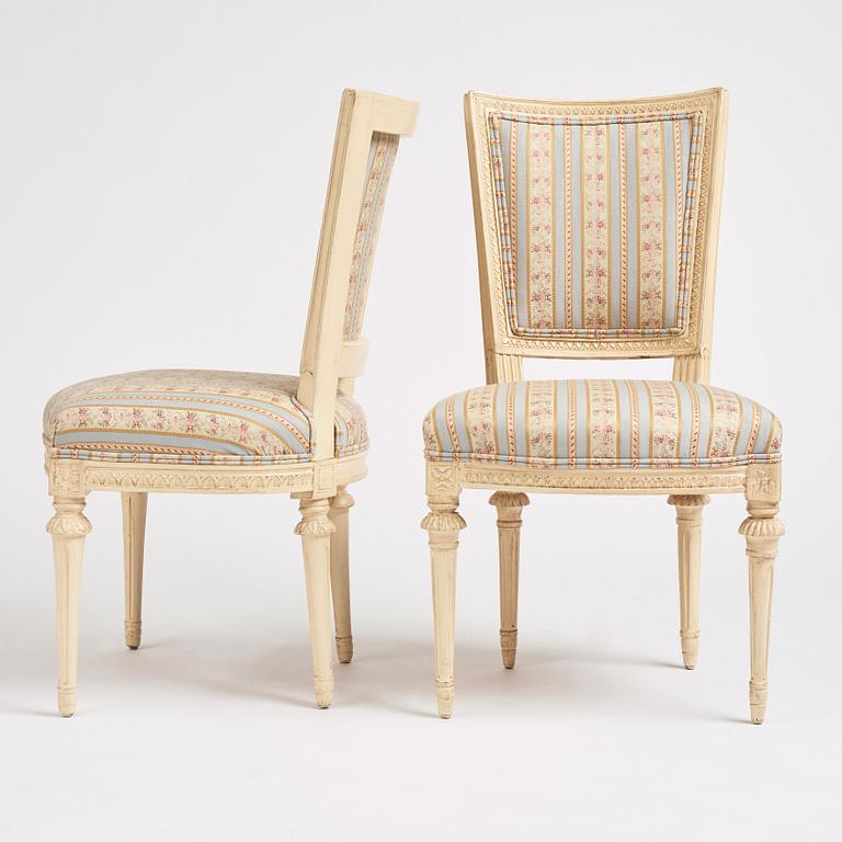 A set of nine Gustavian chairs by A Hellman (master in Stockholm 1761-94) and E Ståhl (master in Stockholm 1794-1820).
