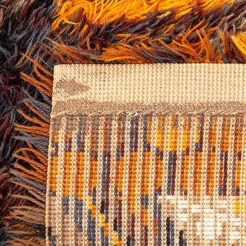 A pair of machine made long pile rugs ca 190 x 137 cm each.